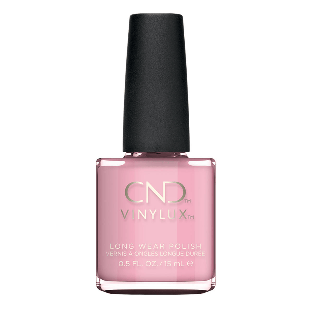 CND Vinylux Be Demure #214 – Pastelpink neglelak på flaske
